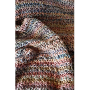 Hand crocheted boho cobble afghan in taupe with subtle wheat blended rainbow colors.