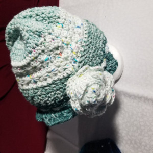 Cozy green and white hued crochet bucket hat 