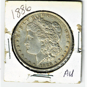 1886 US SILVER MORGAN DOLLAR-AU-HANDSOME
