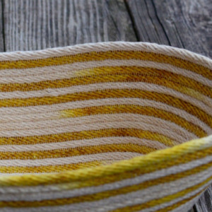 oval coiled rope basket, variegated natural white and yellow