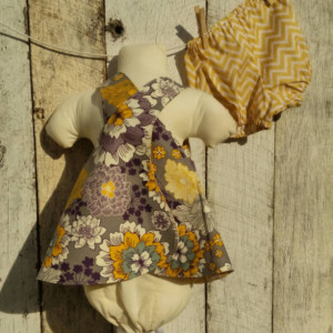 Reversible dress and bloomers set. Grey with yellow and purple flowers.