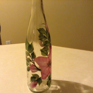 Handpainted oil dispenser with pretty pink wild roses and green leaves. Includes spout.