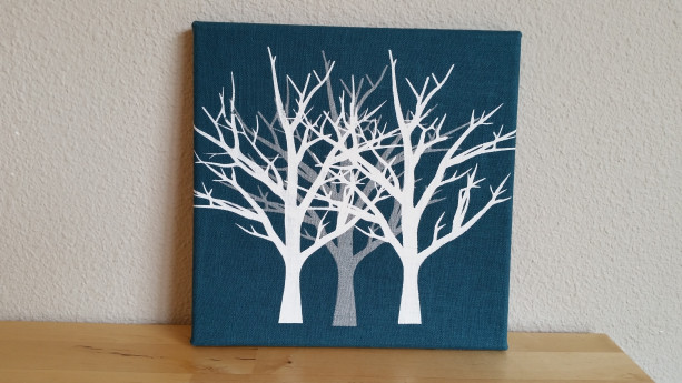 Screenprinted white and silver trees on dark teal blue textured fabric canvas wall art - authentic handmade