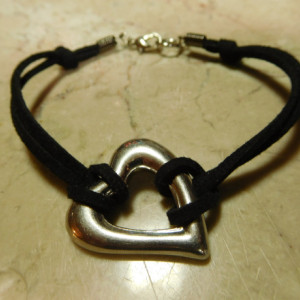 Black Suede/leather bracelet with stainless steel heart connector charm. #B00237
