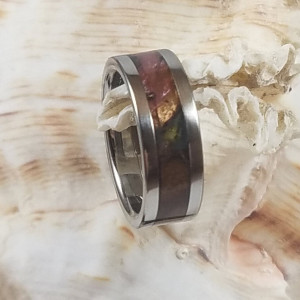 size 4 burl and resin ring around a stainless steel core with stainless steel accent edges 6 mm wide band