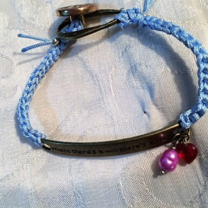 Bracelet baby blue silk hand Crochet cord with "where is a will there is a way" charm connector and decorative button.  #B00225