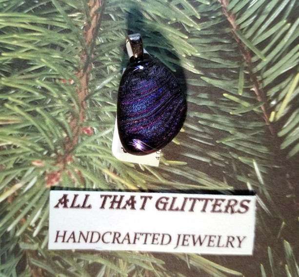 Dichroic Pendant. Black background with blue swirls and a sterling silver finding. Great gift idea for any holiday, birthday, anniversary.