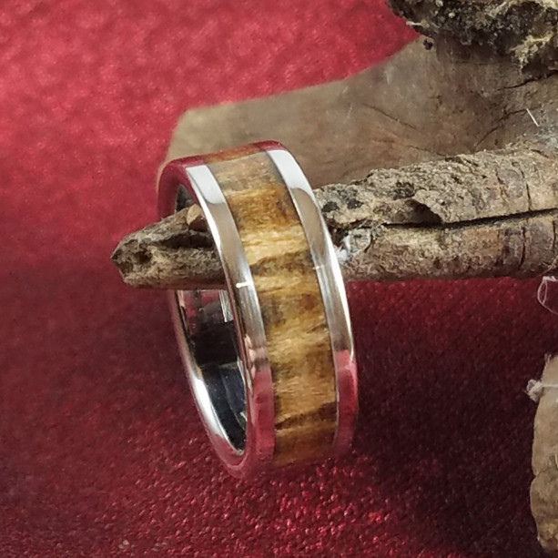 size 7 pinecone wood ring, stainless steel core with stainless steel edges, 7mm band width