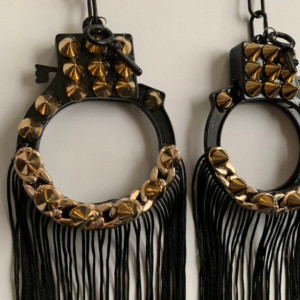 Gold spike handcuff earrings