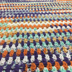 Handmade multicolored "wildflower" crochet childs blanket