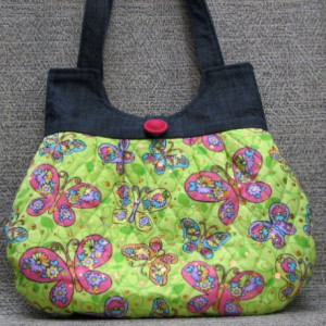 Lime and pink butterfly quilted hobo style handbag with denim top