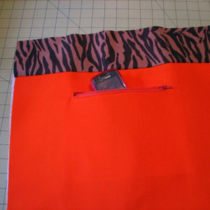 Zebra print pleated hobo style bookbag / tote with orange interior pocket organizer