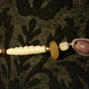 Brown and purple beaded book mark