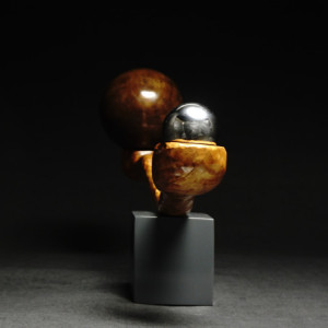 Original, hand carved wood, steel and porcelain sculpture from sustainably collected materials