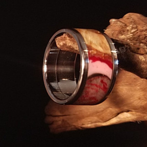 Size 4 3/4 Maple burl ring, Stainless Steel core and outer edges, red, pink, and black resin highlights