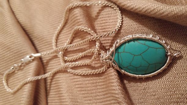 Silver and turquoise framed pendant