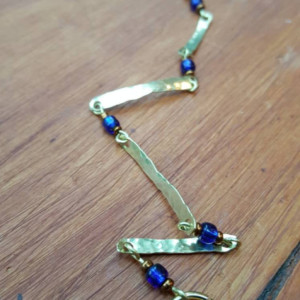 hand hammered golden brass links and blue beads bracelet