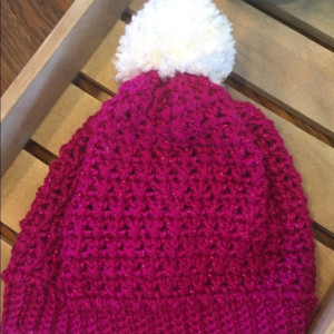 Hot pink sparkle beanie hat with white pom pom