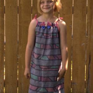 Upcycled pillowcase dress with butterfly