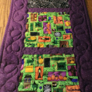 Halloween table topper. Handmade quilted halloween table runner.  Witches and gooblins halloween table decor.