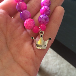 Stretch bracelet, silver princess crown charm, pink and purple