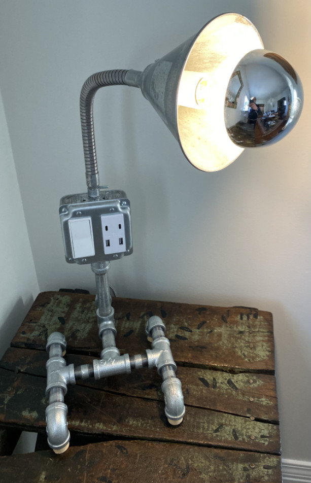 Lamp handcrafted from Industrial iron pipe.
