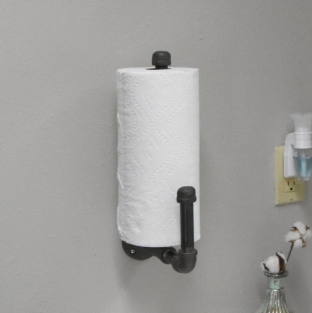 Wall mounted paper towel holder.
