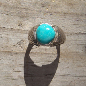 Sterling silver ring set with a turquoise stone. 
