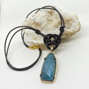 Josephine knotted leather necklace with teal colored pendant