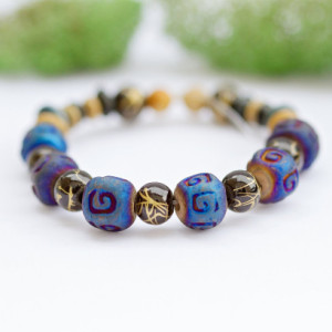 Boho bohemian stretch bracelet/Blue ceramic stone,rubber coated black beads/Various wooden beads/Nickel free/Under 20 dollars