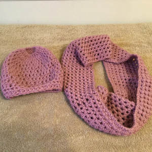 Crocheted cowl and messy bun/ponytail hat