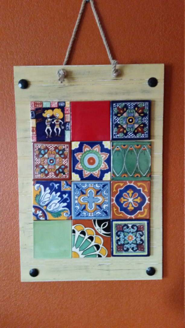Rustic, handmade wooden wall hanging with Talavera tile accents