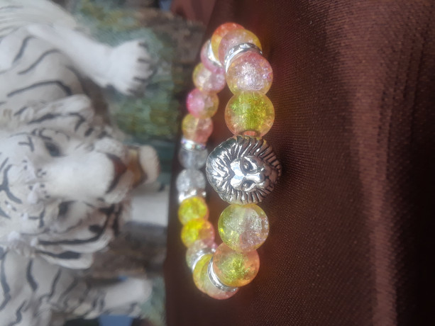 Yellow colored lion charmed braclet 