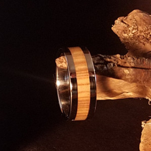 Size 9 1/2 Olive wood ring, Stainless steel core with stainless steel edges, 7mm band width