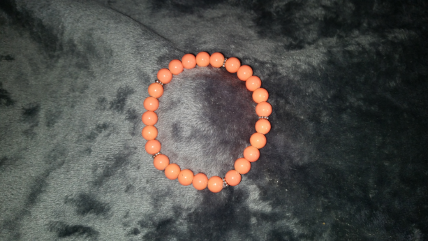 Orange and daisy beaded bracelets