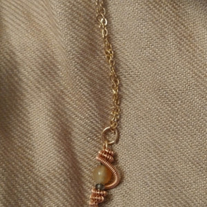 Drop pendant with stellar swirl in copper