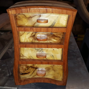 Bandsaw box made from ebiara,pine,osb,and buckeye burl