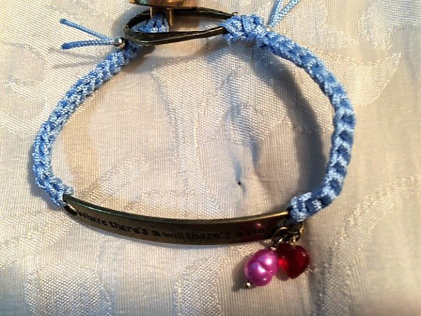 Bracelet baby blue silk hand Crochet cord with "where is a will there is a way" charm connector and decorative button.  #B00225