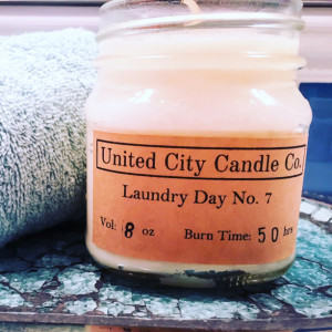 Laundry Day No. 7 --Afternoon sun shinning down on crisp cotton shirts. 100% soy candle. United City Candle Co.Made in USA