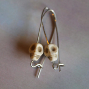 Skull Resin Bead Silver Toned Elongated 1 and half Inch Earrings