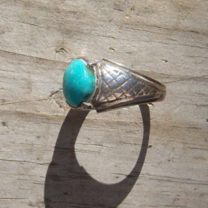 Sterling silver ring set with a turquoise stone. 