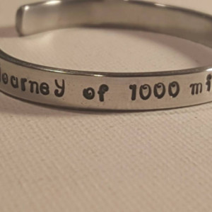 A journey of a thousand miles begins with a single step/personalized aluminum handstamped 12 gauge cuff