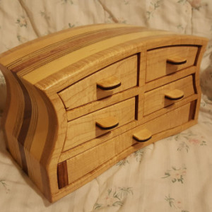 Jewelry box made from quilted maple,patagonia rosewood,wenge, pine,and plywood