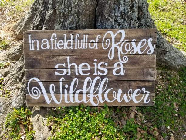 In a field full of roses she is a wildflower handpainted pallet sign, nursery decor, little girl room wall hanging art, rustic pallet art