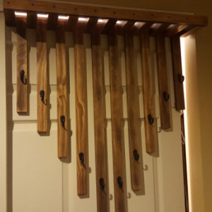 Rustic custom wall mounted hanger.