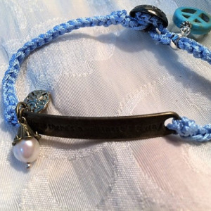 Bracelet baby blue silk hand Crochet cord with "where is a will there is a way" charm connector and decorative button.  #B00224