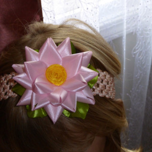 Baby/toddler light pink flower on stretchable peachy headband