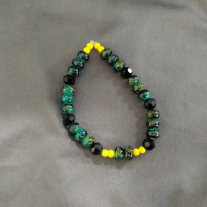 Black and Green Beaded Bracelet with Yellow Trim by Cumulus Luci