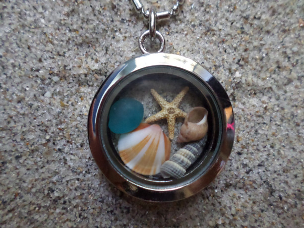 glass locket w. shells, sea glass & starfish