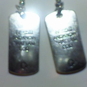 Homemade Double Sided Earring, Protect Me on a Cross. Reverse side Be still and know that I am God. Silver in color.